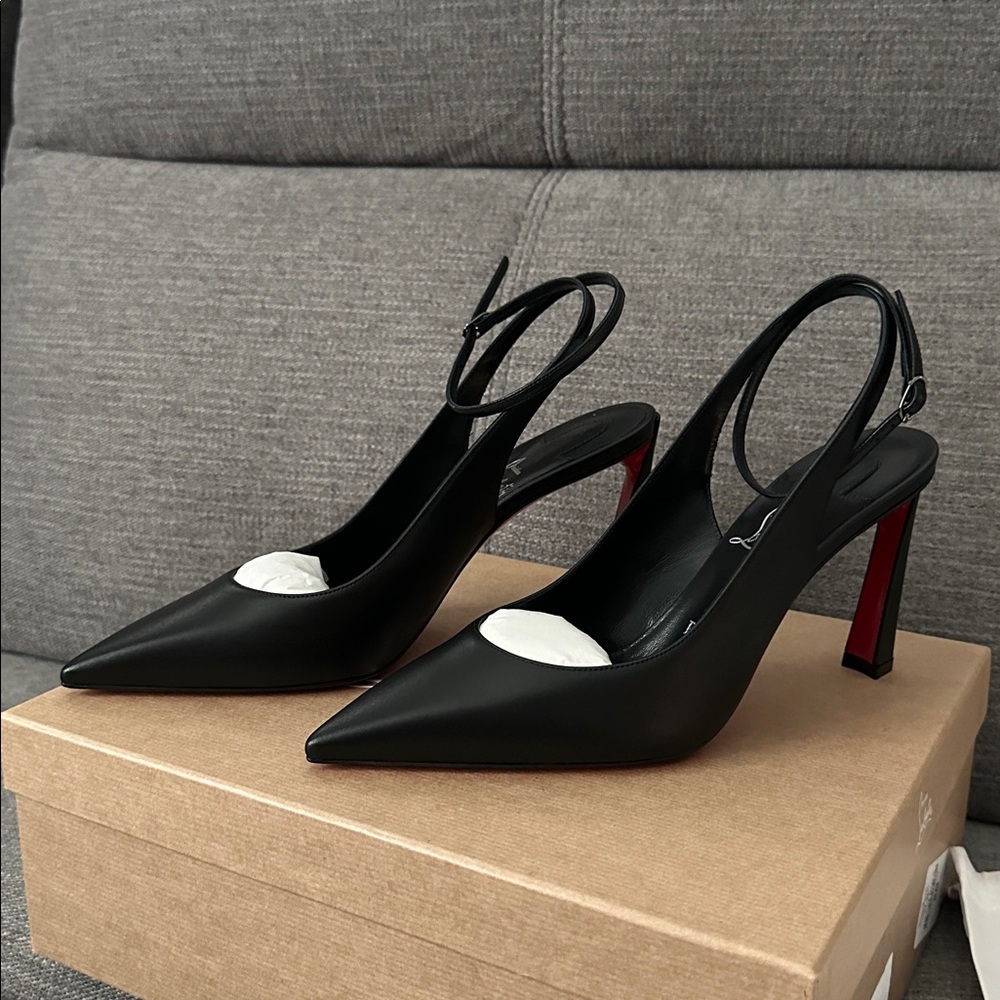 Christian Louboutin Black and Red Heels
Condora 85